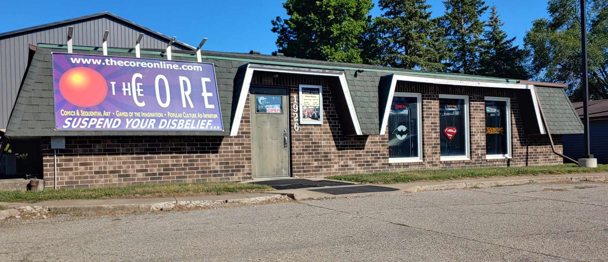 The CORE storefront on Valley Park Drive with its red-orb sign